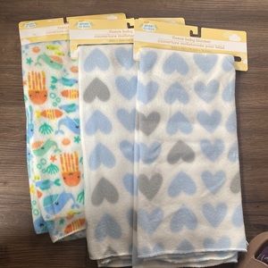 Three brand new fleece baby blankets